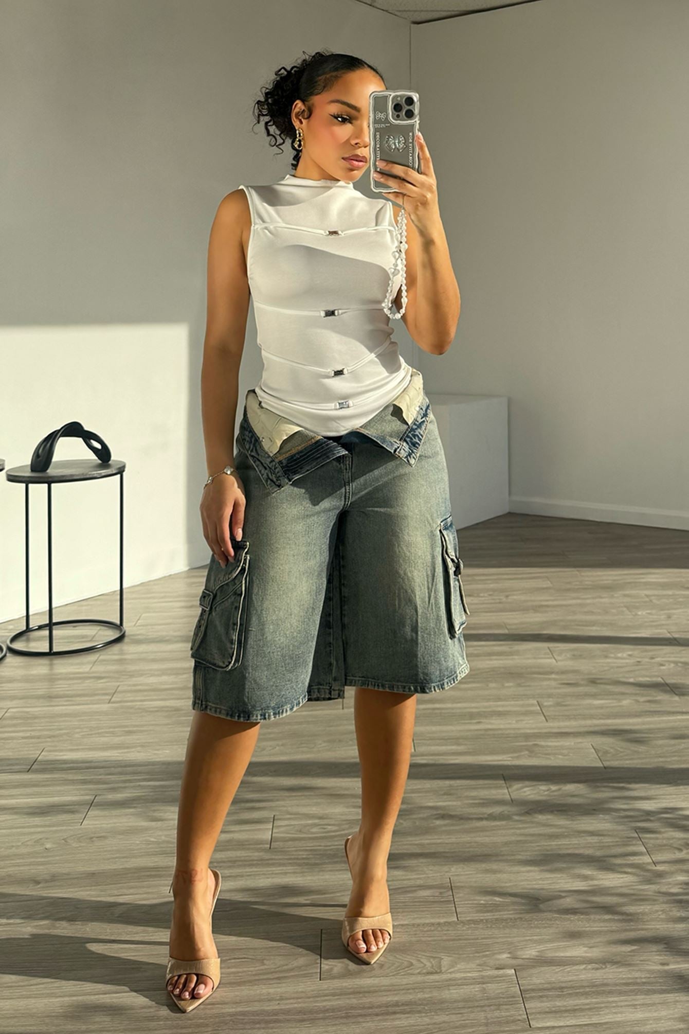 Unconditional Buckle Sleeveless Top